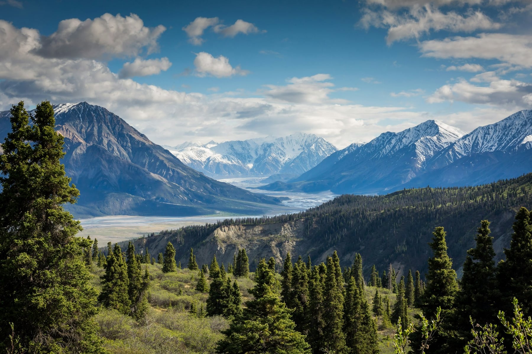 Dramatic mountain valley under a clouded sky