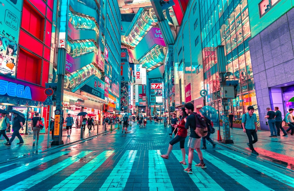 Tokyo city streets and illuminated signs at dusk