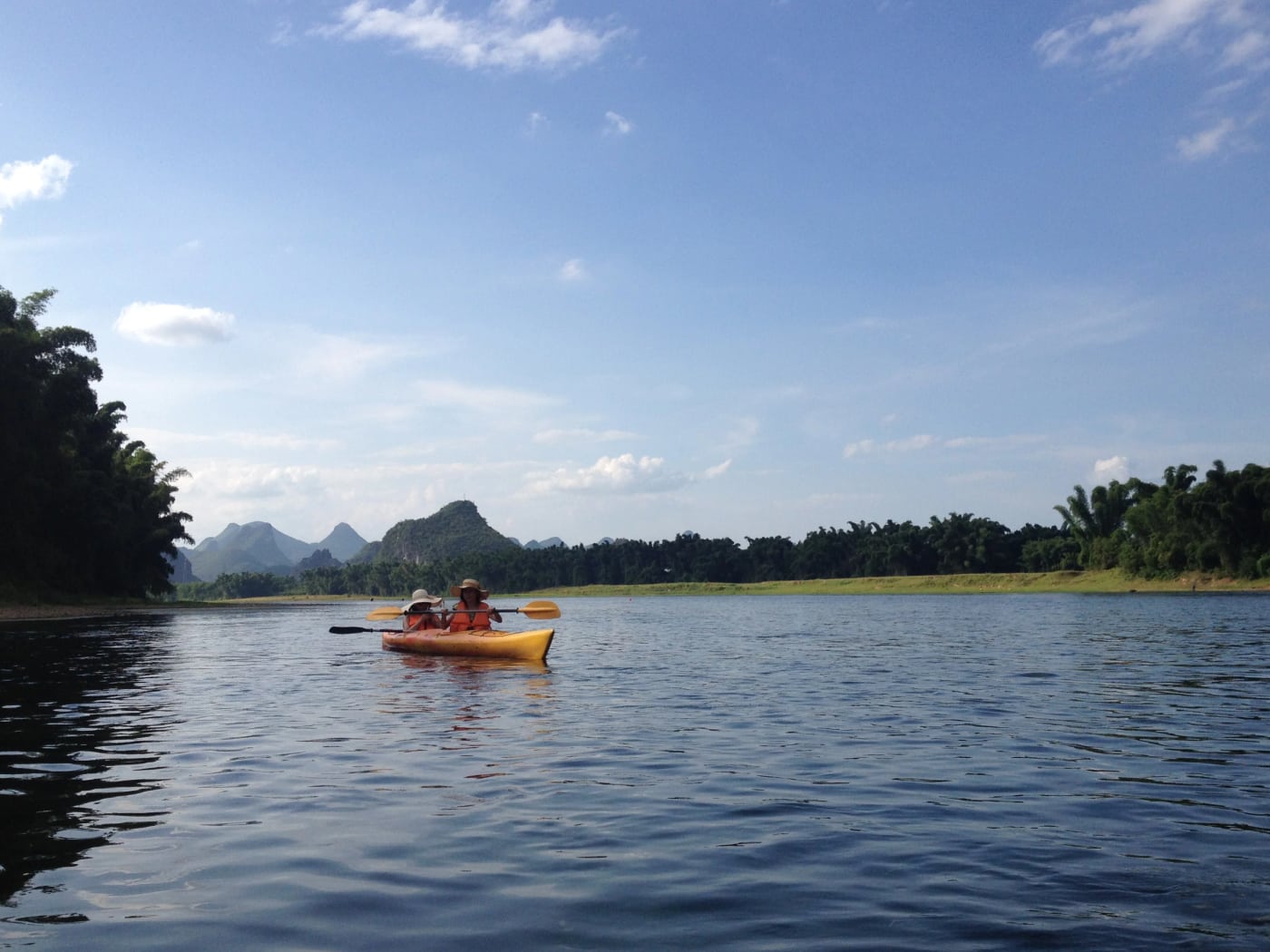 A guided kayaking group on the Yulong River